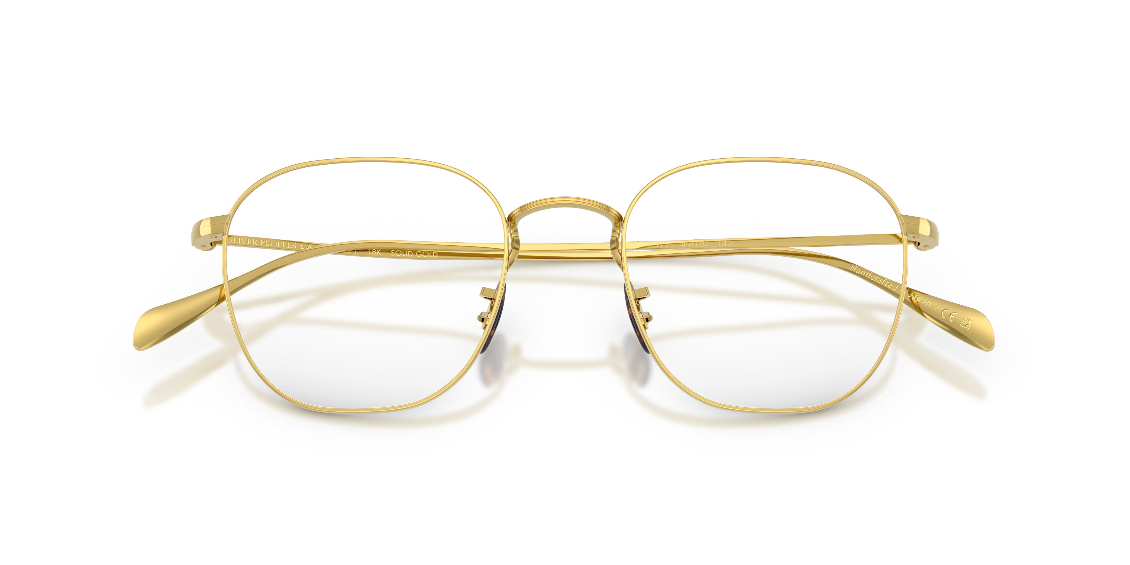 Oliver Clyne Solid Gold Eyeglasses in Solid Gold | Oliver®